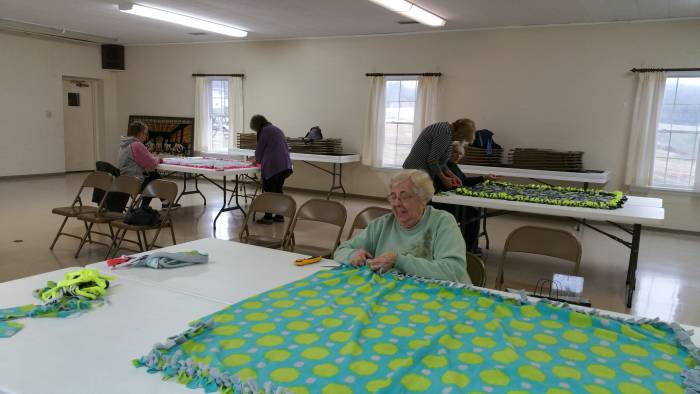 Working on the Blankets of Love mission at the Paoli United Methodist Church.