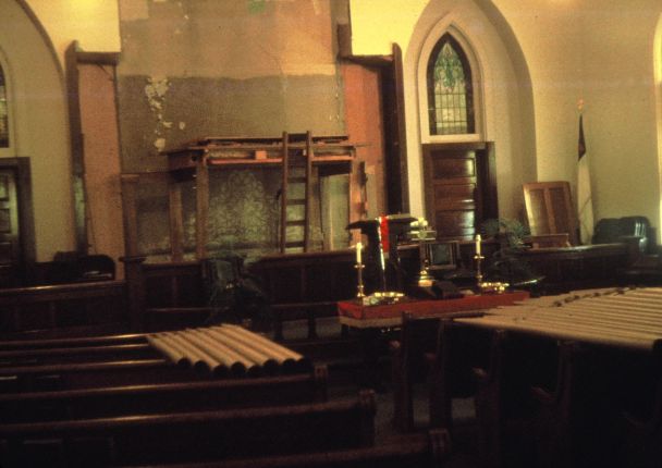 Interior of the old Methodist Church building in central Paoli as the pipe organ is being disassembled.