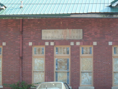 'Health and Happiness' sign on the former Lithia Springs Company bottling plant in Paoli, Indiana.