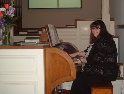 Sara Barnett Seidner playing the Pilcher pipe organ at the Paoli United Methodist Church.