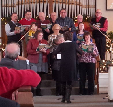 The chancel choir singing a cantata during the service at the Paoli United Methodist Church.