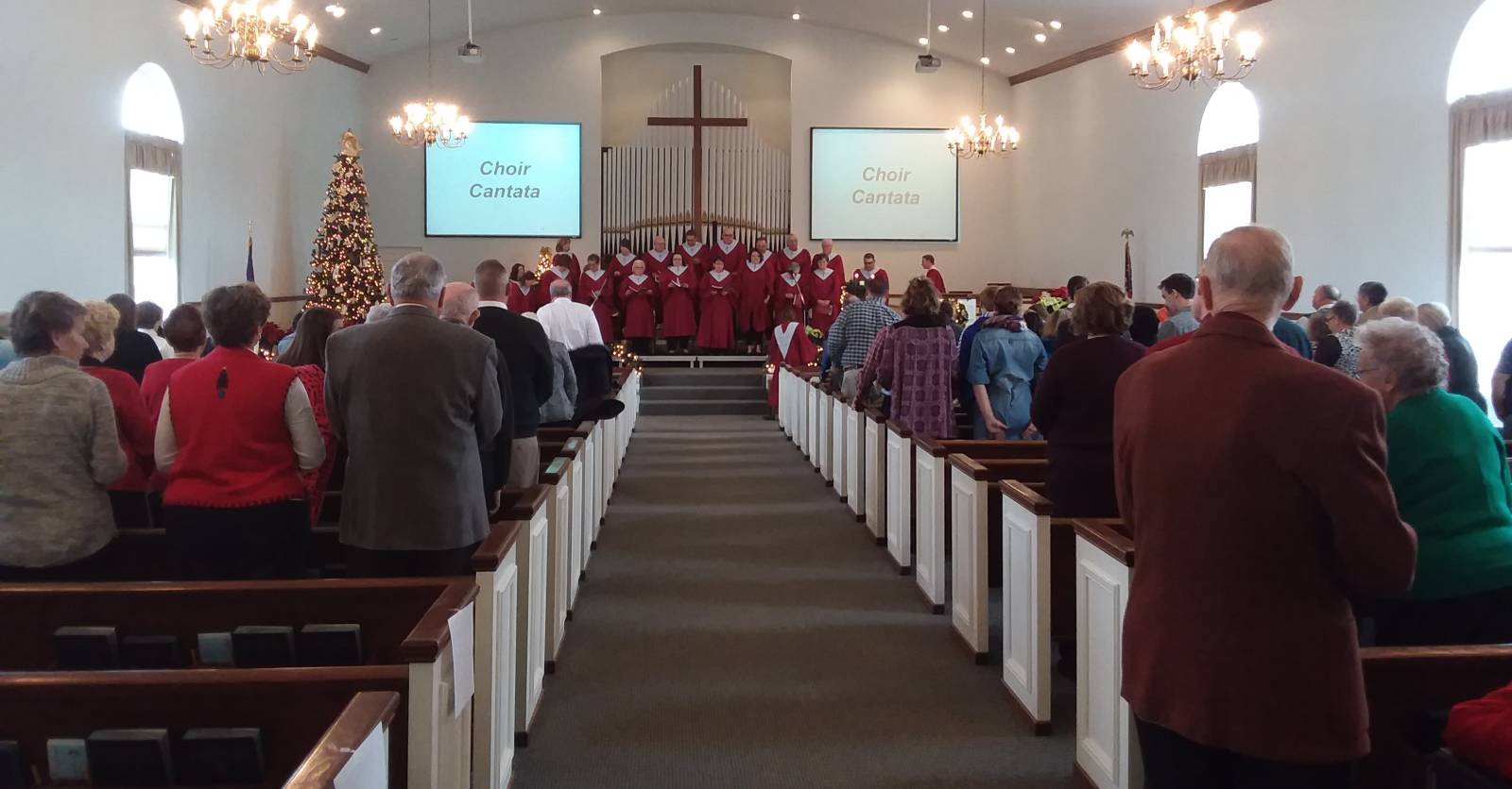 The choir performs a Christmas cantata at the Paoli United Methodist Church.