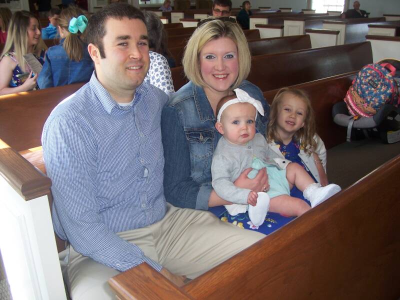 A young family attending a worship service at the Paoli United Methodist Church