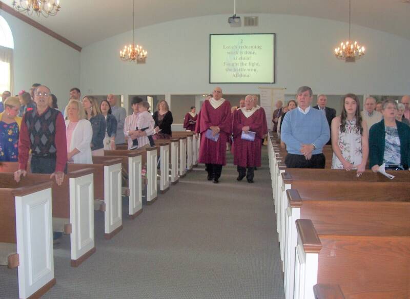 The choir enters the Easter worship service at the Paoli United Methodist Church