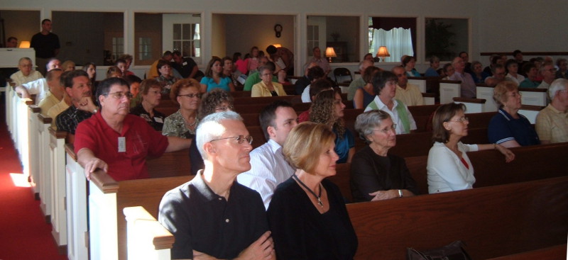 Sanctuary of the Paoli United Methodist Church during a Sunday morning worship service.