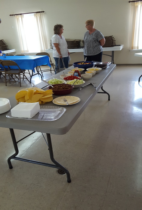 Table of food at Vacation Bible School.