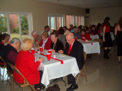 Paoli United Methodist Church members enjoying the Valentine's Day dinner hosted by the 6:01 Youth.