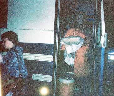 People in the dark on board God's Nightcrawler, an overnight church bus.