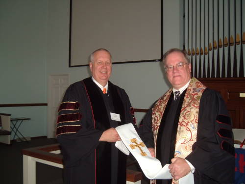 Rev. Dr. Gary Schaar appointing the Rev. Dr. LaMont Bonath as pastor of Paoli United Methodist Church for a second year.