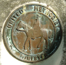 Copper medallion of an early Methodist circuit rider placed on William Beauchamp's grave in Paoli, Indiana in the mid 1980s.