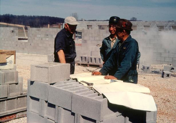 Lester Sturm, Hilbert Fisher and Robert Starr reviewing construction plans.