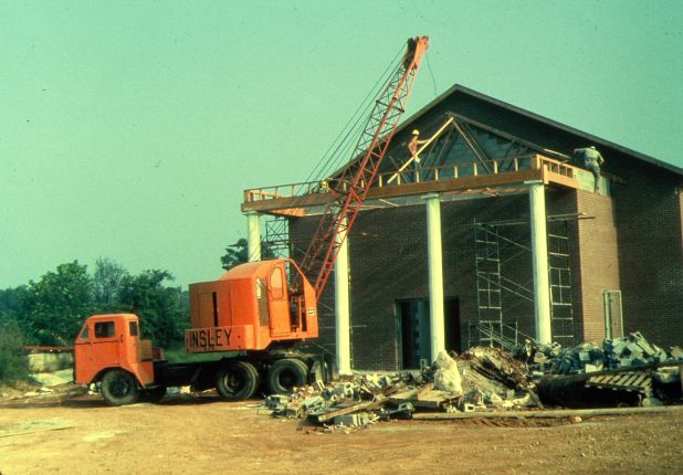 Columns and portico being added to a church.
