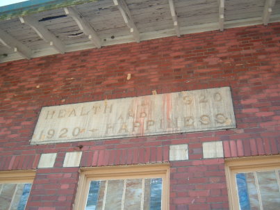 'Health and Happiness' sign on the former Lithia Springs Company bottling plant in Paoli, Indiana.