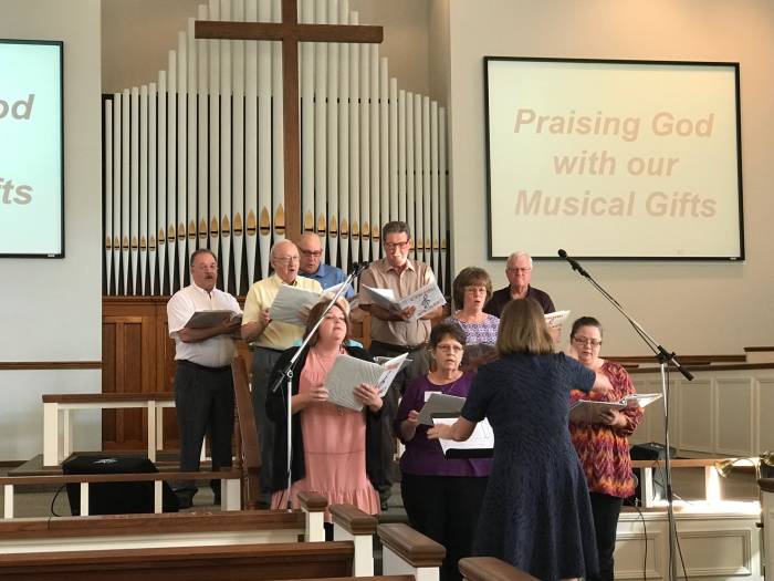 The chancel choir sings at the Paoli United Methodist Church.