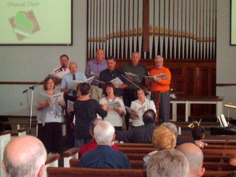 The chancel choir sings at the Paoli United Methodist Church.