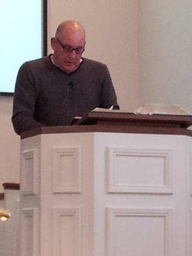 Darryl Newkirk reads scripture during a worship service at the Paoli United Methodist Church.