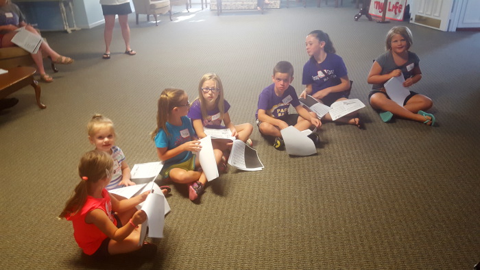 Children playing games at Vacation Bible School.