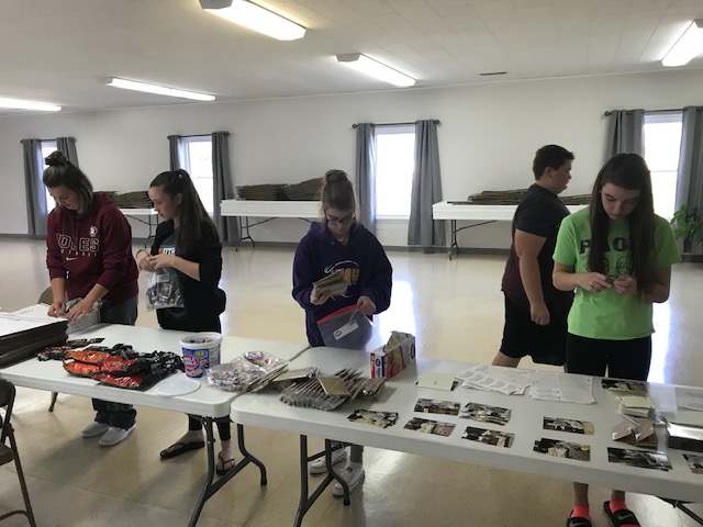 Paoli UMC Jr/Sr High class baking cookies for care packages for college students.
